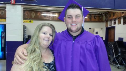 The family of Austin McEwen, a 26-year-old independent contractor of Amazon killed at one of the company's facilities in Edwardsville, Illinois, during a tornado in December 2021, will sue the company for wrongful death. Alice McEwen, his mother, can be seen with him in this undated photo.