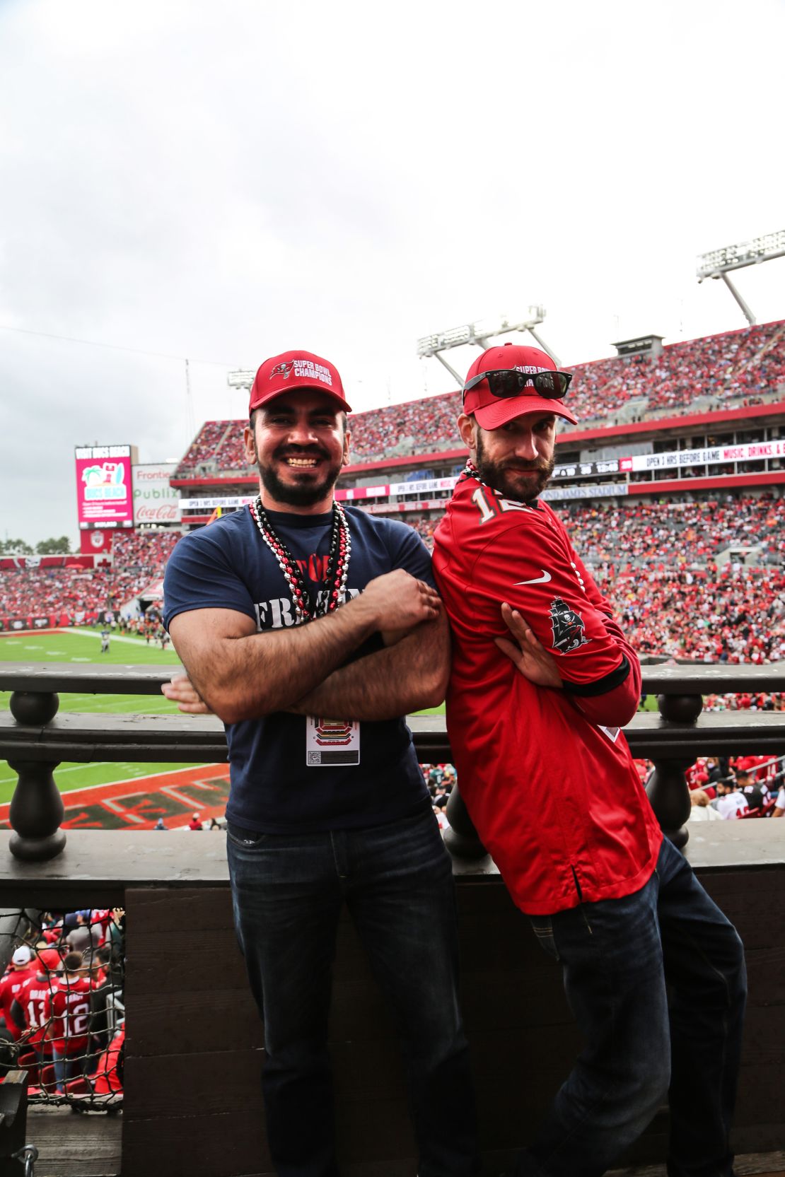 Said Noor, left, and Steve Morse cheer on the Buccaneers from the famed pirate ship inside the stadium on Sunday, January 16.
