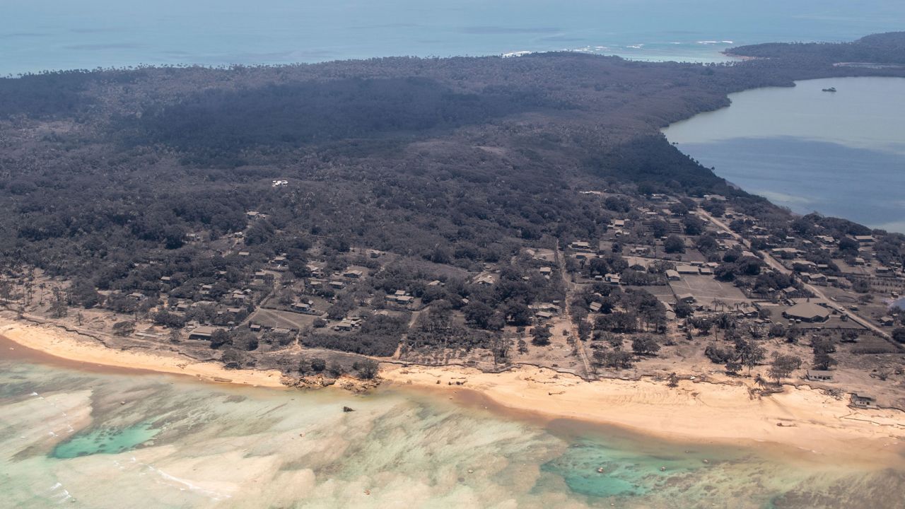 An aerial view from a P-3K2 Orion surveillance flight shows heavy ash fall in Nomuka, Tonga, on January 17, 2022.