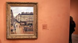 This May 2005 file photo shows the Impressionist painting by Camille Pissarro called the "Rue Saint-Honore apre-midi. Effet de Pluie (Rue Saint-Honore Afternoon, Rain Effect),"  in the Thyssen-Bornemisza Museum in Madrid. 