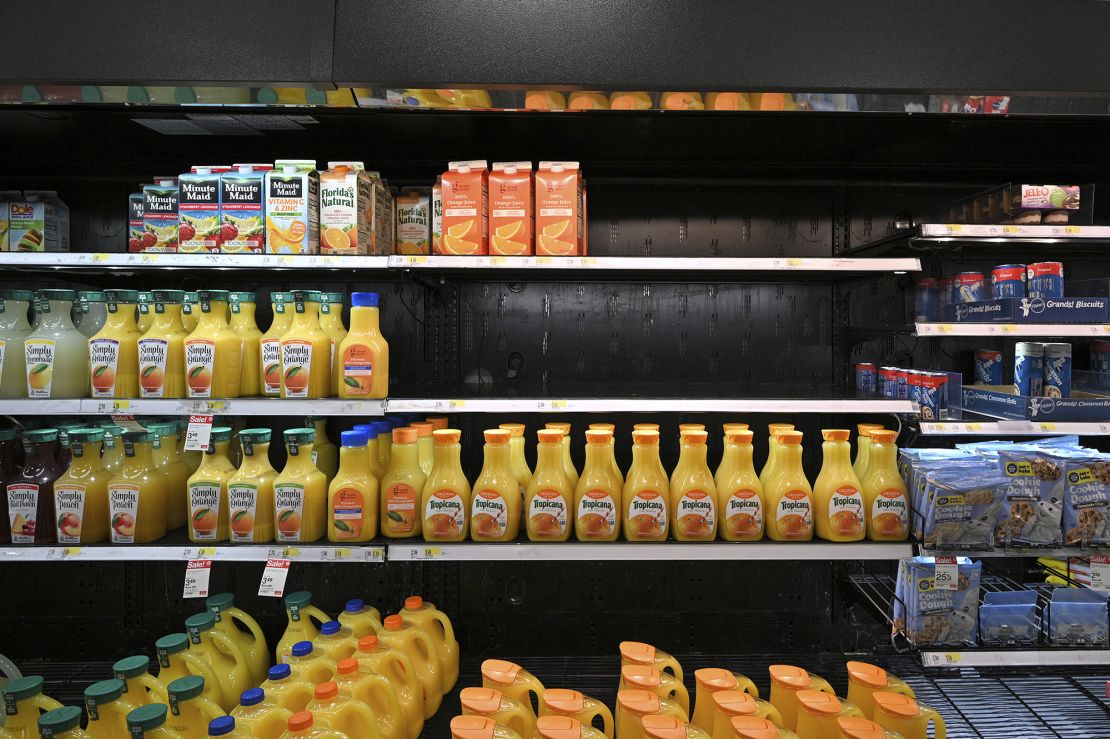 Half a shelf sits empty of orange juice at a Target store in the Queens borough of New York City, NY, on October 19, 2021.
