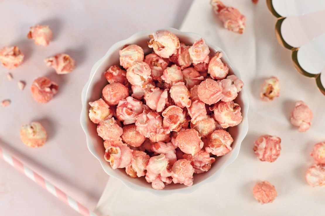 Pulverized freeze-dried strawberries give popcorn a pretty pink hue.