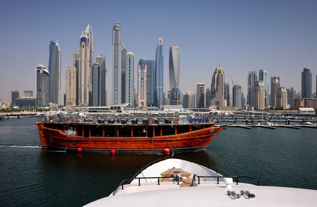 A restaurant cruiser sails by the Dubai Marina Beach.