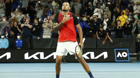 MELBOURNE, AUSTRALIA - JANUARY 18: Nick Kyrgios of Australia reacts after winning his first round singles match against Liam Broady of Great Britain during day two of the 2022 Australian Open at Melbourne Park on January 18, 2022 in Melbourne, Australia. (Photo by Darrian Traynor/Getty Images)