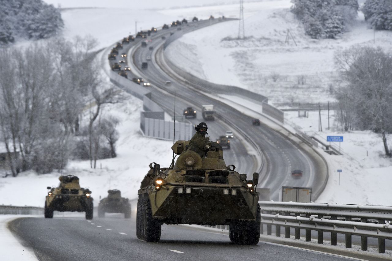 A convoy of Russian armored vehicles moves along a highway in Crimea on Tuesday January 18. Russia has concentrated an estimated 100,000 troops with tanks and other heavy weapons near Ukraine in what the West fears could be a prelude to an invasion. 