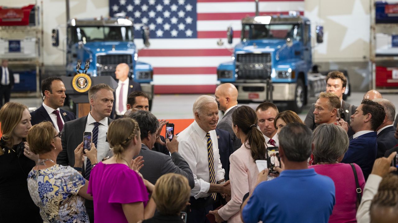 Biden greets attendees at the Mack Trucks Lehigh Valley Operations facility in Macungie, Pennsylvania, in July 2021.