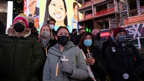 A candlelight vigil in honor of Michelle Alyssa Go was held in Times Square Tuesday, January 18.