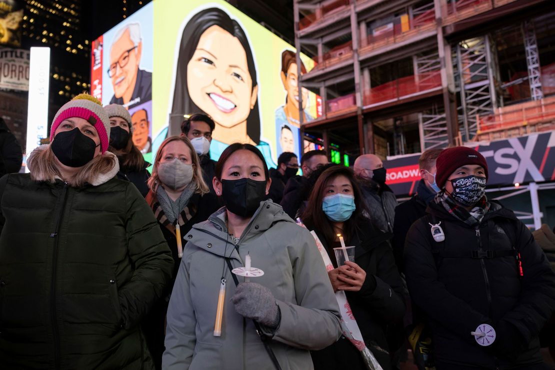 A candlelight vigil in honor of Michelle Alyssa Go was held in Times Square Tuesday, January 18.