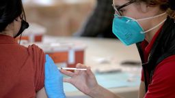 A medical staff member inoculates a person with a dose of COVID-19 vaccine at a vaccine clinic in San Antonio, Texas, the United States, Jan. 9, 2022. 