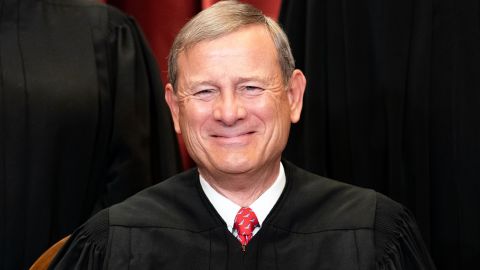 Chief Justice John Roberts sits during a group photo of the Justices at the Supreme Court on April 23, 2021. 
