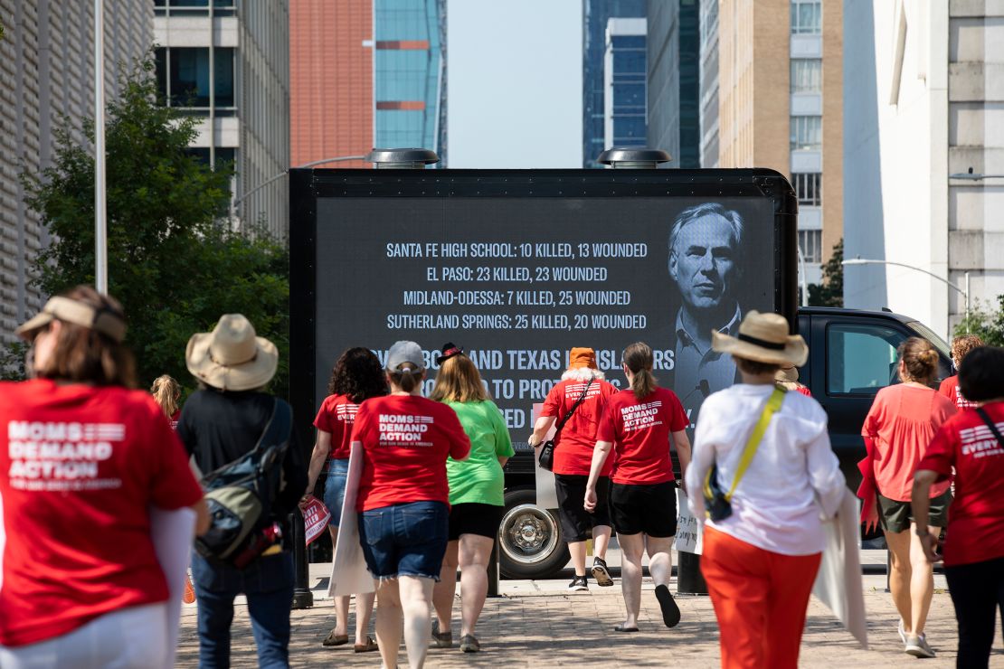 Members of Moms Demand Action protest in Texas on Thursday, June 17, 2021, in Austin, Texas, after Gov. Greg Abbott signed a bill allowing Texans age 21 or older to carry handguns without a permit. 