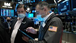 Traders work on the floor of the New York Stock Exchange on January 18 in New York City.