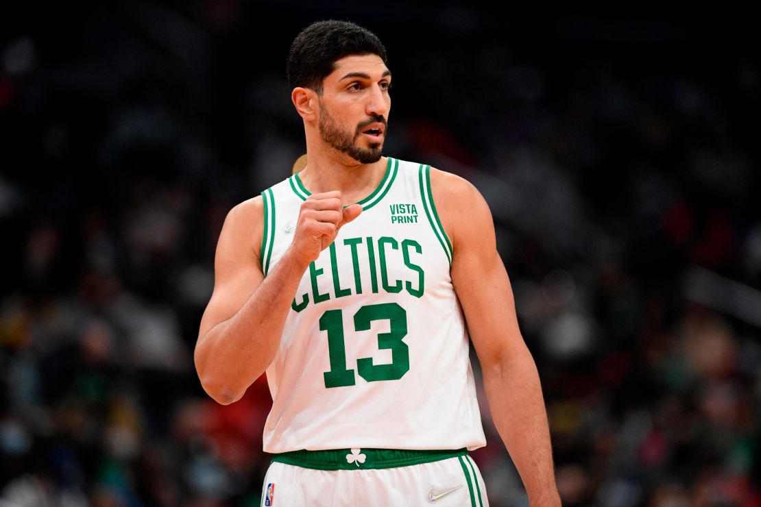 Boston Celtics center Enes Kanter (13) looks on during the first half of an NBA basketball game against the Washington Wizards, Saturday, Oct. 30, 2021, in Washington. (AP Photo/Nick Wass)