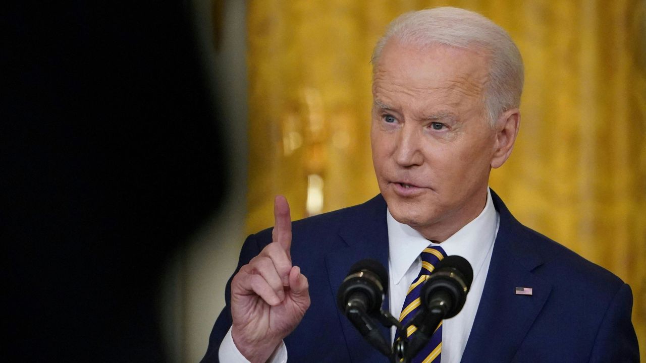 US President Joe Biden answers questions during a news conference in the East Room of the White House, on January 19, 2022, in Washington, DC. 