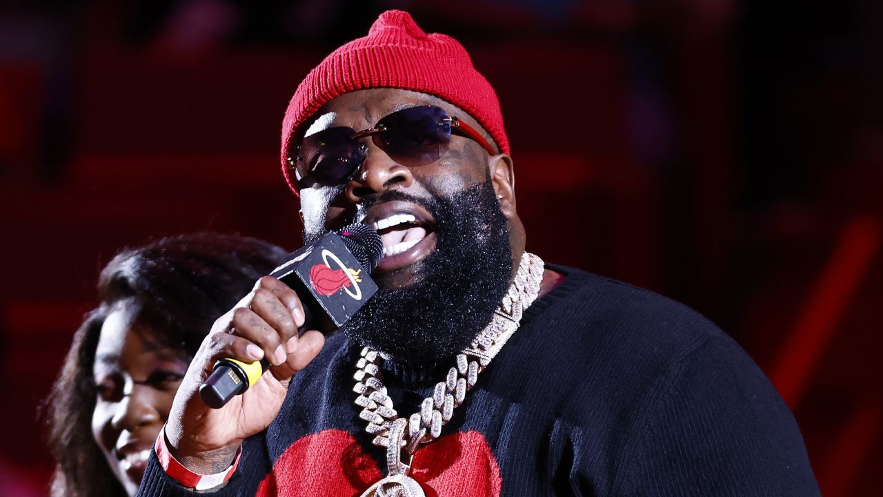 Rick Ross announces his album during a time-out in the game between the Miami Heat and the Boston Celtics at Miami's FTX Arena on November 4, 2021.