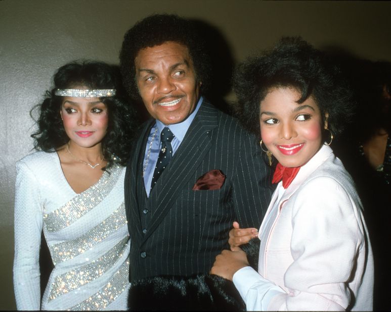 Janet Jackson, right, attends the R&B Awards with her father, Joe Jackson, and sister, LaToya Jackson, on February 4, 1983, in Los Angeles. 