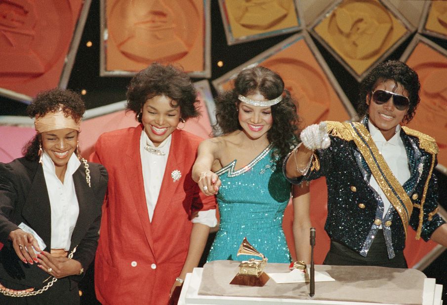 Pop superstar Michael Jackson is joined on stage by his sisters, from left, Maureen "Rebie," Janet and LaToya during the 26th annual Grammy Awards on February 29, 1984, in Los Angeles.