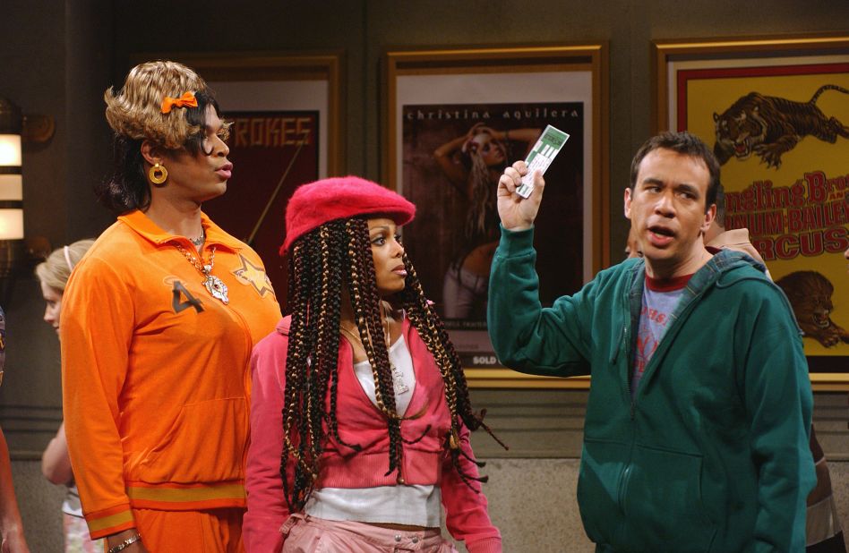 Finesse Mitchell, Janet Jackson and Fred Armisen as a ticket scalper in the "Janet Ticket Line" skit on "Saturday Night Live" on April 10, 2004.