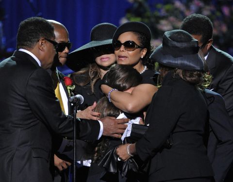 Janet Jackson comforts her niece, Paris Jackson, during the memorial service for Michael Jackson at the Staples Center in Los Angeles on July 7, 2009.