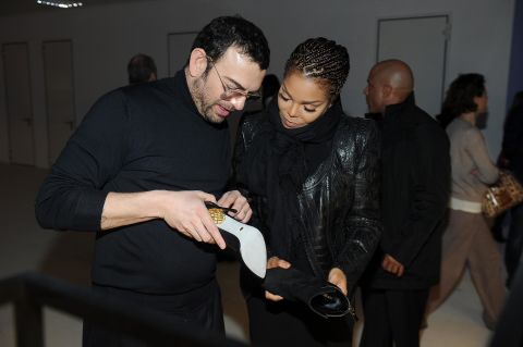 Francesco Russo and Janet Jackson attend an event at Milan Fashion Week on February 21, 2013, in Milan, Italy.