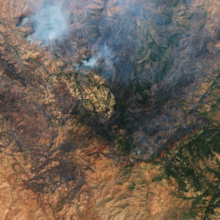 This image from a Copernicus Sentinel-2 satellite, from June 24, 2019, shows wildfires east of Phoenix, Arizona. It also shows the red lines of flame retardant sprayed from aircraft and colored red so firefighters can see it. The climate crisis is <a href="index.php?page=&url=https%3A%2F%2Fedition.cnn.com%2F2020%2F08%2F24%2Fweather%2Fcalifornia-wildfires-climate-change%2Findex.html" target="_blank">promoting wildfires throughout the western US</a>.  <br />