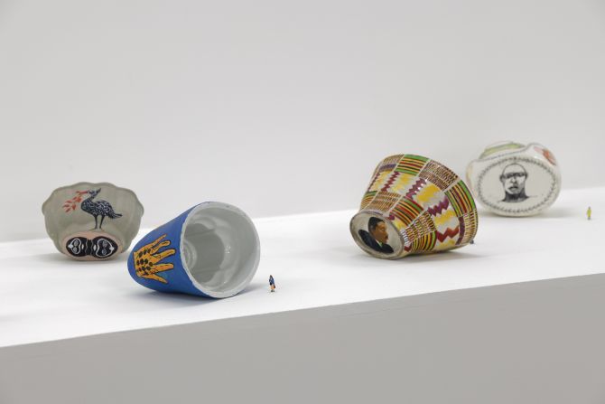 These works by Himid draw attention to the contribution of Black diasporas to the UK's history and culture.  - <em>Lubaina Himid - "Jelly Mould Pavillons for Liverpool" (2010)</em>
