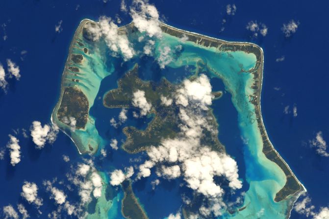 Taken by Pesquet in July 2021, this photograph shows Bora Bora and its turquoise lagoon protected by a coral reef. Sea level rises due to climate change <a href="index.php?page=&url=https%3A%2F%2Fwww.sea.edu%2Fspice_atlas%2Fclimate_change_atlas%2Fsea_level_rise_in_tahiti_french_polynesia" target="_blank" target="_blank">could pose a threat</a> to French Polynesian islands like this one.