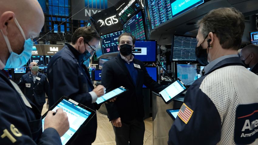 Traders work on the floor of the New York Stock Exchange (NYSE) on January 20 in New York City.