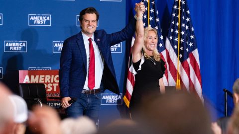 Reps. Matt Gaetz, a Republican from Florida, left, and Marjorie Taylor Greene, a Republican from Georgia, are seen in Dalton, Georgia, in May 2021. 