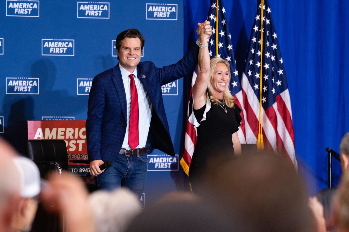 Reps. Matt Gaetz, a Republican from Florida, left, and Marjorie Taylor Greene, a Republican from Georgia, are seen in Dalton, Georgia, in May 2021. 