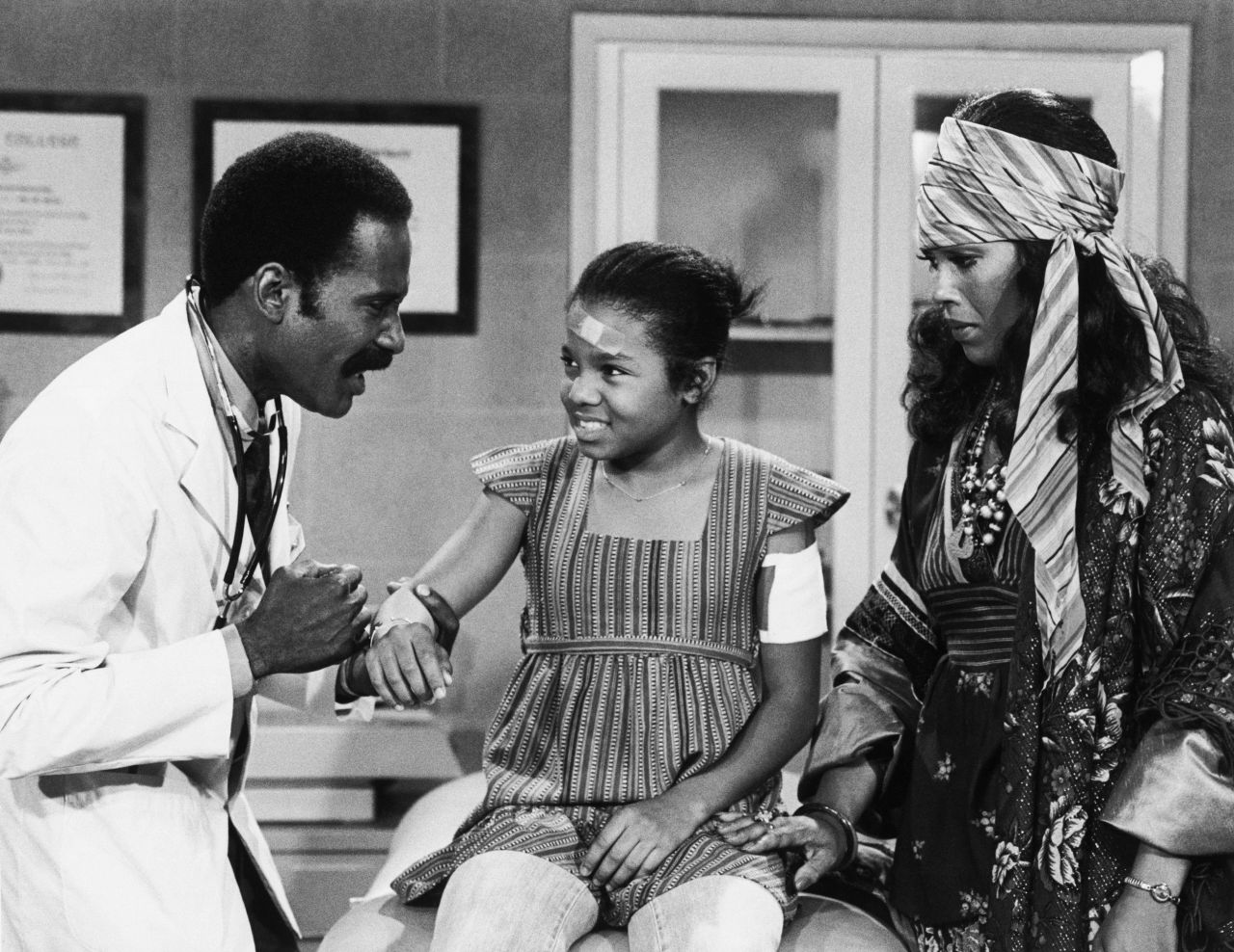 Janet Jackson appears in a 1977 episode of the TV sitcom "Good Times" alongside actors Bob Delegall and Ja'net DuBois.