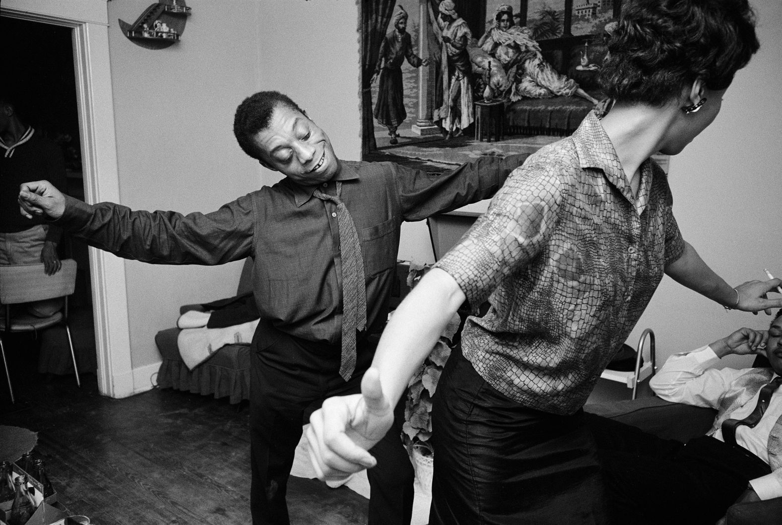 Writer James Baldwin dances in New Orleans with a woman who worked for the Congress of Racial Equality. "Baldwin introduced me to the civil rights movement," <a href="index.php?page=&url=https%3A%2F%2Floeildelaphotographie.com%2Fen%2Fin-memoriam-james-baldwin-steve-schapiro-the-fire-next-time-dv%2F" target="_blank" target="_blank">Schapiro wrote.</a> "I read his article about the conditions of Blacks in America, which later became 'The Fire Next Time,' and immediately called my editor at Life asking if I could do a photo essay on Baldwin. He struck me as someone who was particularly charismatic in the way he was influencing a very important subject."