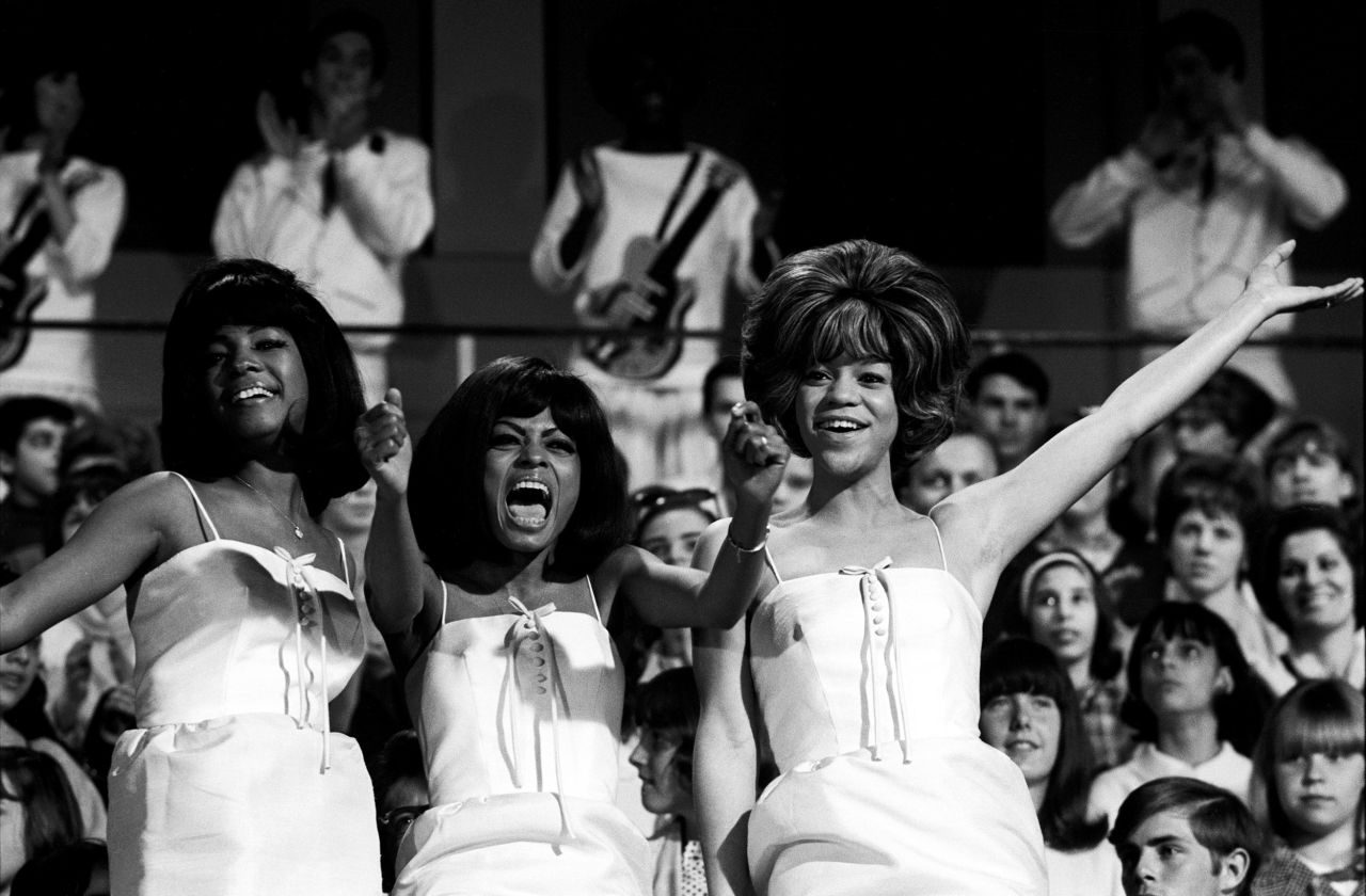 The Supremes — from left, Mary Wilson, Diana Ross and Florence Ballard — perform at a concert circa 1965.