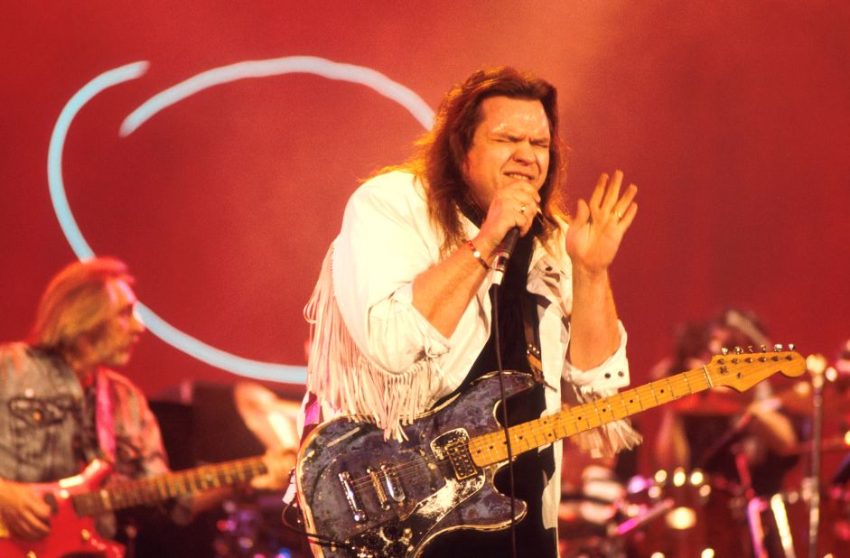 Meat Loaf performs with John Entwistle of The Who in 1987 in London.