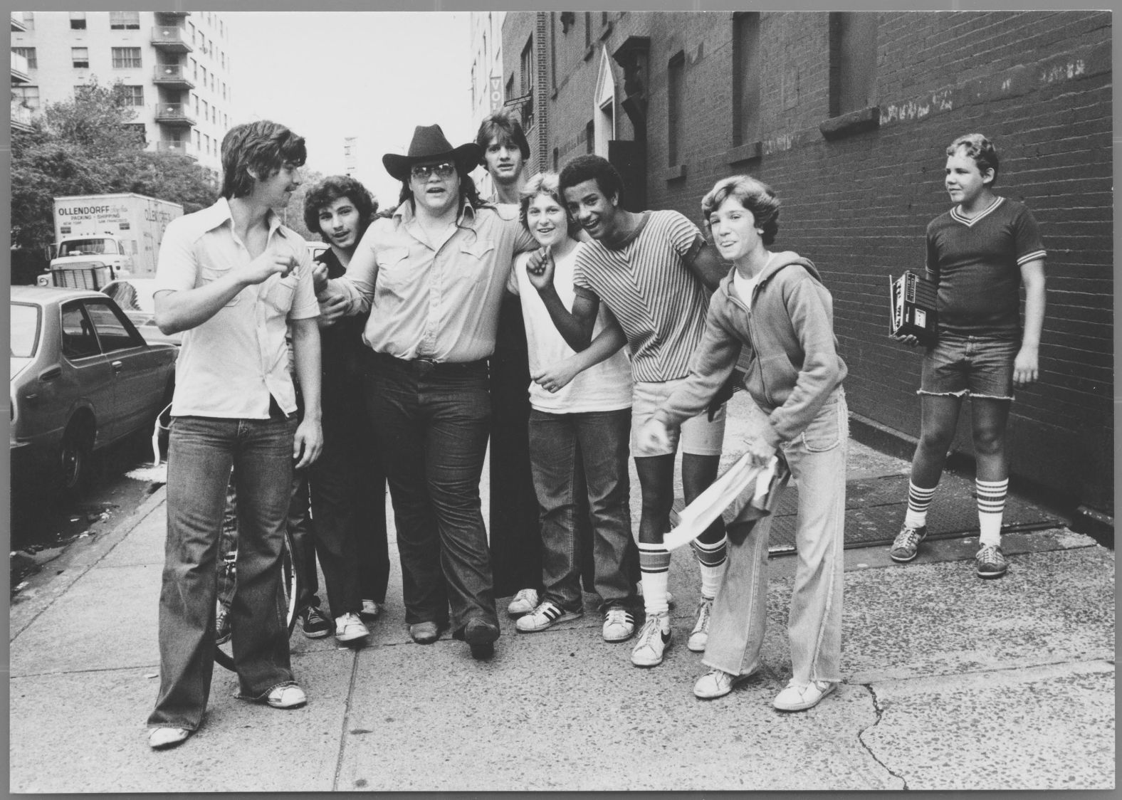 Meat Loaf poses with fans. 