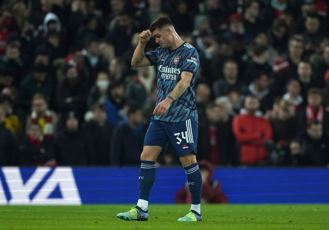 Xhaka leaves the field after being sent off in the first-leg at Anfield.