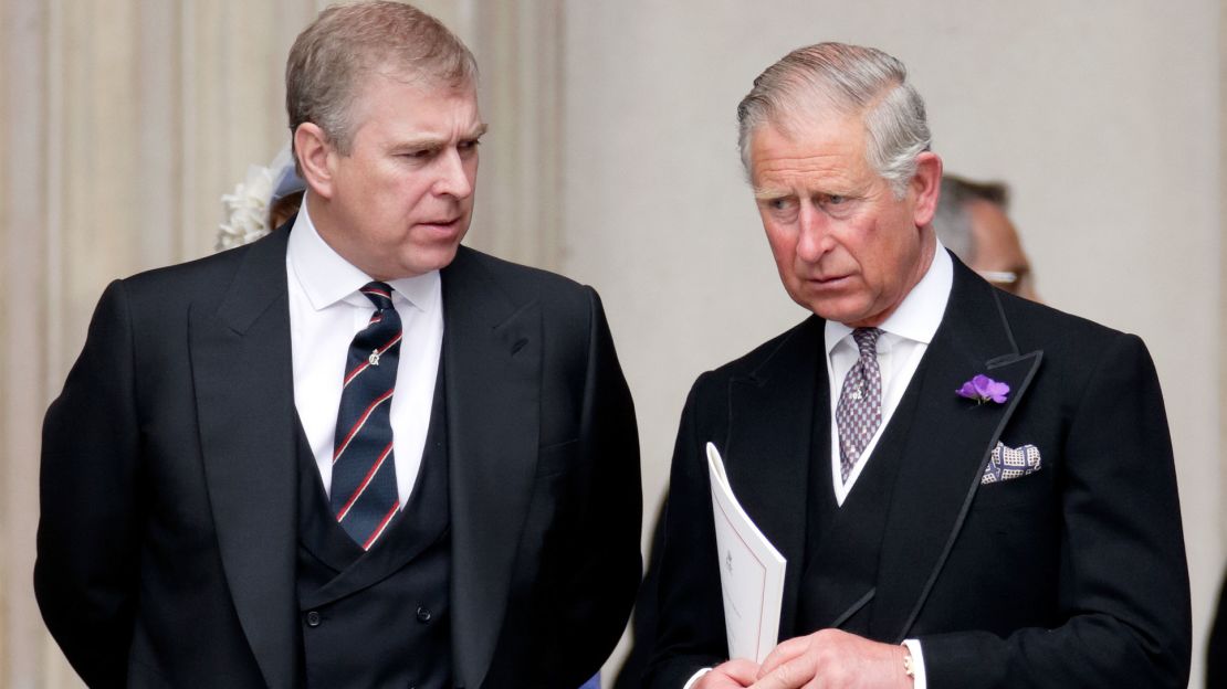 Prince Charles speaks with his younger brother, Prince Andrew, at a thanksgiving event marking the Queen's Diamond Jubilee in 2012. 