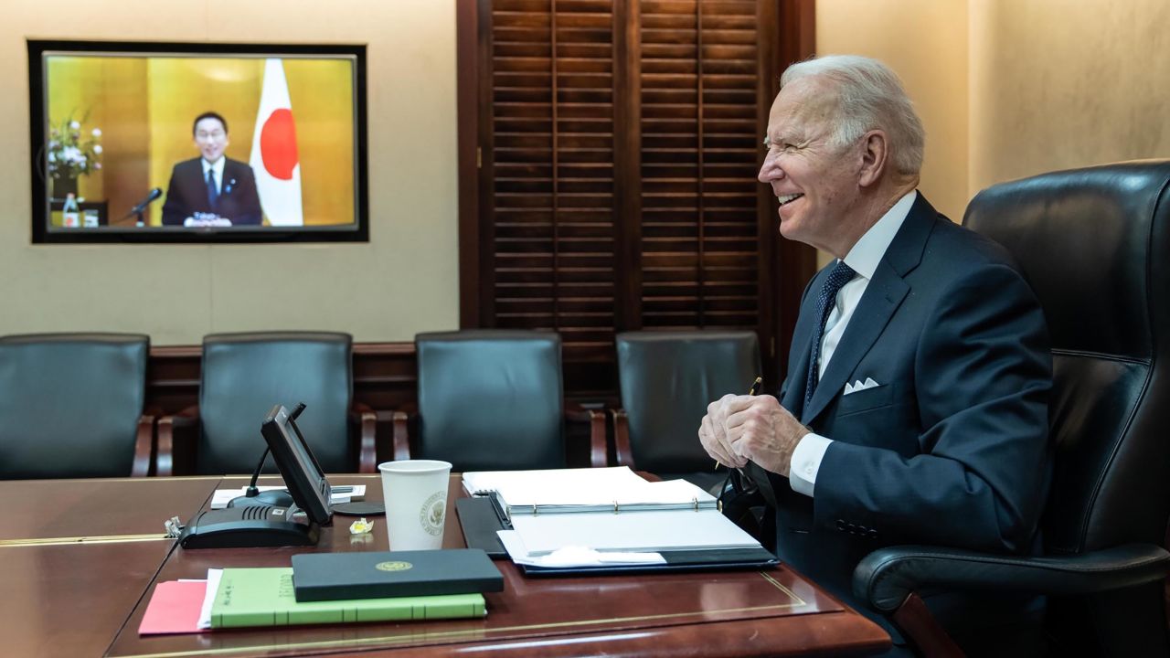 In this White House handout photo, President Joe Biden meets virtually with Prime Minister Fumio Kishida of Japan on January 21, 2022.