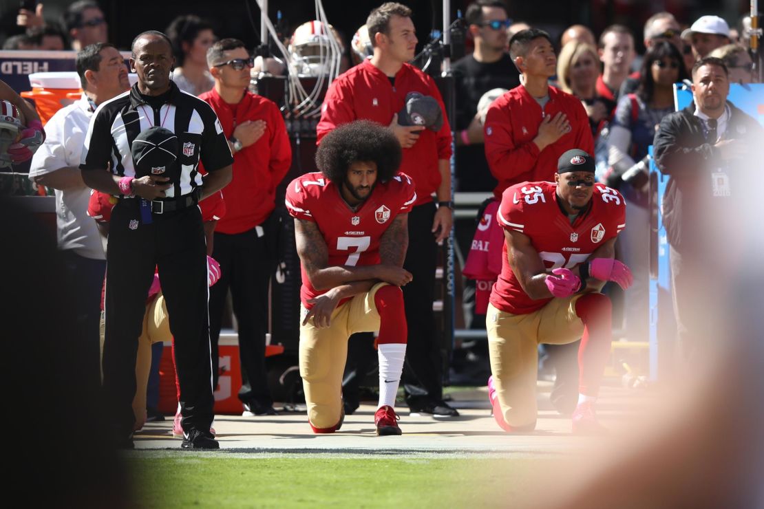 Kneeling during the national anthem as a protest against social injustice became a large political issue in the US from the time Colin Kaepernick (seen here with then teammate Eric Reid of the 49ers) began the trend in 2016.