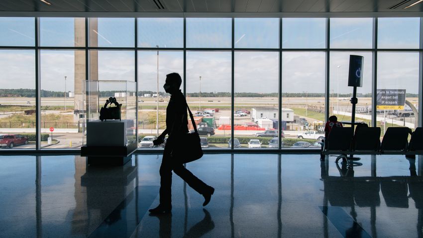 A traveler walks through the George Bush Intercontinental Airport on December 03, 2021 in Houston, Texas.