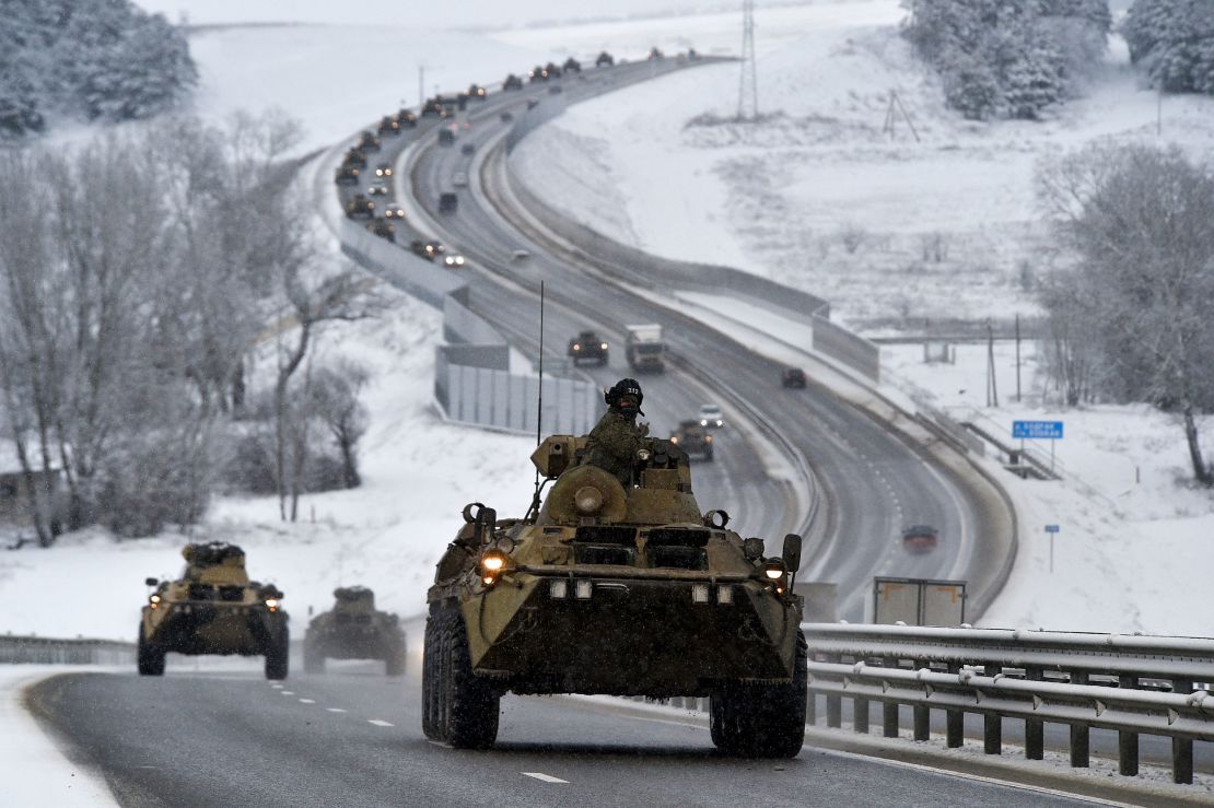 A convoy of Russian armored vehicles moves along a highway in Crimea earlier this month.