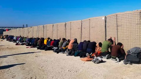 This photo provided by the Kurdish-led Syrian Democratic Forces shows some Islamic State group fighters who were arrested.