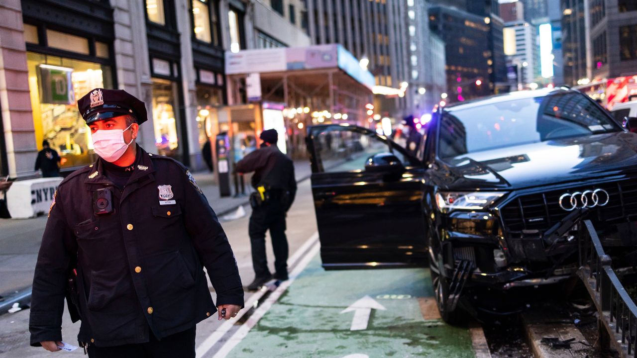 The NYPD at the scene of a suspected carjacking just north of Times Square on January 12. The number of carjackings quadrupled in New York City over the last four years, according to data released by the NYPD. 