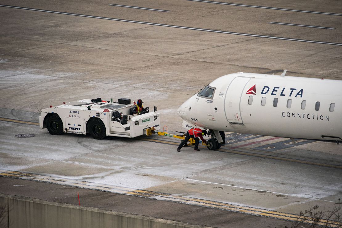 A Delta Air Lines Inc. plane is prepared for taxiing at Raleigh-Durham International Airport (RDU) in Morrisville, North Carolina, U.S., on Thursday, Jan. 20.
