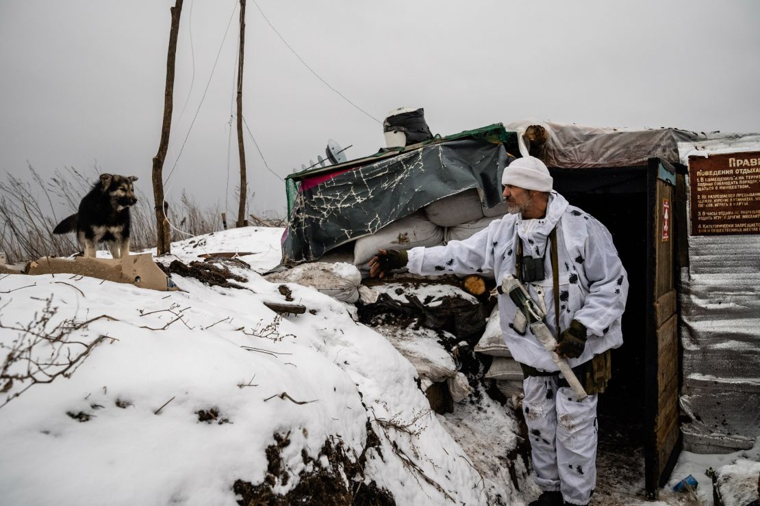 Ukrainian soldiers are seen at a defensive trench position on the front line, 500 yards from separatists' positions, on January 21, 2022, in Ukraine's eastern Luhansk region.