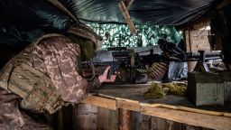 A Ukrainian soldier at a gunner position in a trench on the front line, 500 yards from separatists' positions, Friday January 21, 2022 in Slov'yanoserbs'k, Luhansk region of Ukraine. These soldiers believe a Russian attack is inevitable and are expecting it soon.