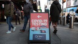 NEW YORK, NEW YORK - JANUARY 21: People pass Covid-19 testing site along a Manhattan street on January 21, 2022 in New York City. Two years ago, the CDC confirmed the first known case of coronavirus in the U.S. As New York City's Covid numbers begin to plateau, and in some neighborhoods sharply drop, Covid case numbers are still increasing in many regions of America.  (Photo by Spencer Platt/Getty Images)