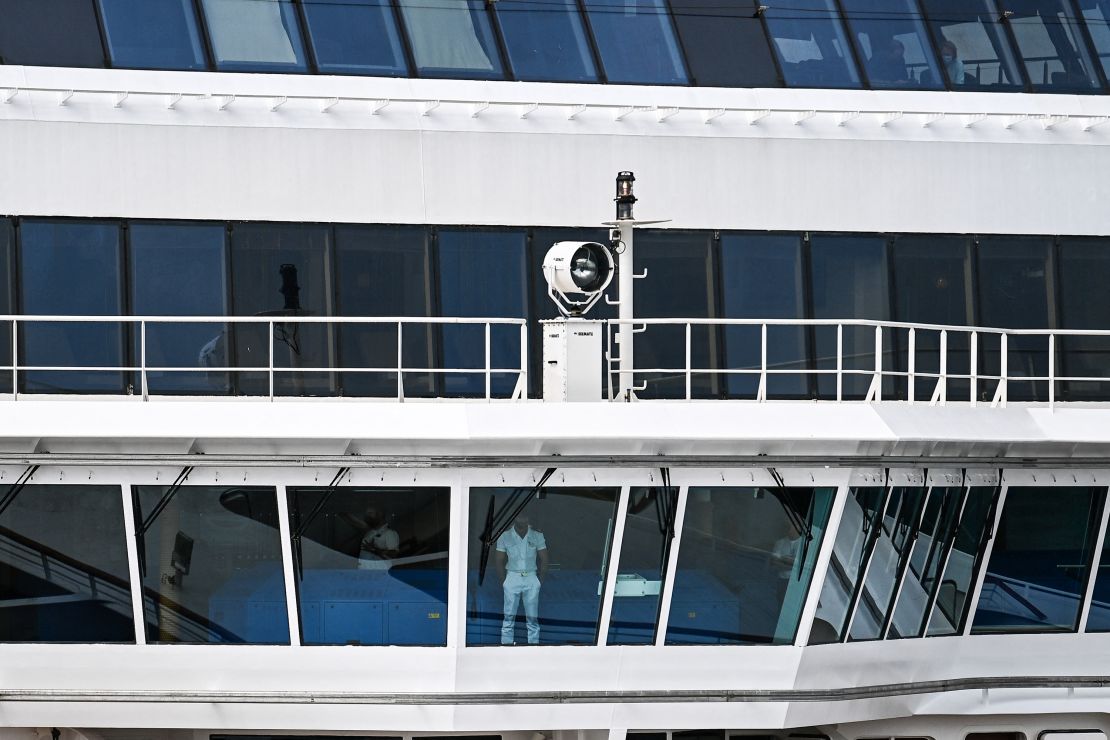 Crew members on board the Norwegian Pearl, which returned to Miami after only one day at sea in early January 2022. 