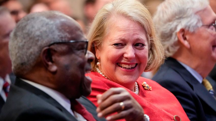 WASHINGTON, DC - OCTOBER 21: (L-R) Associate Supreme Court Justice Clarence Thomas sits with his wife and conservative activist Virginia Thomas while he waits to speak at the Heritage Foundation on October 21, 2021 in Washington, DC. Clarence Thomas has now served on the Supreme Court for 30 years. He was nominated by former President George H. W.  Bush in 1991 and is the second African-American to serve on the high court, following Justice Thurgood Marshall. (Photo by Drew Angerer/Getty Images)