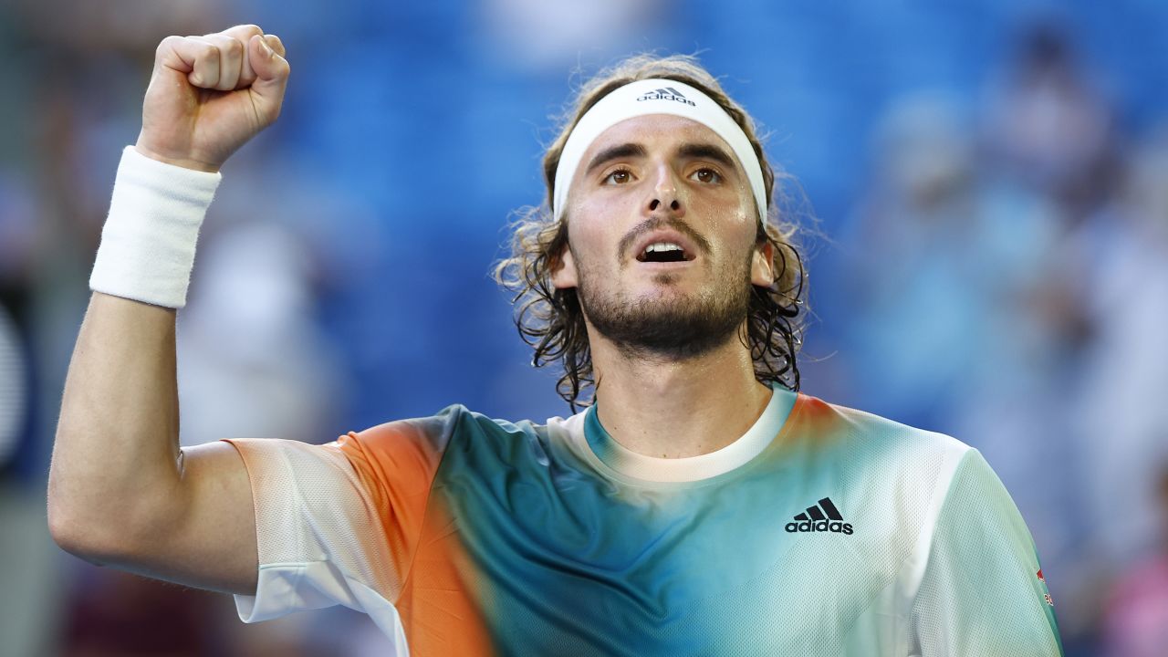 Stefanos Tsitsipas celebrates victory in his third-round singles match against Benoit Paire.